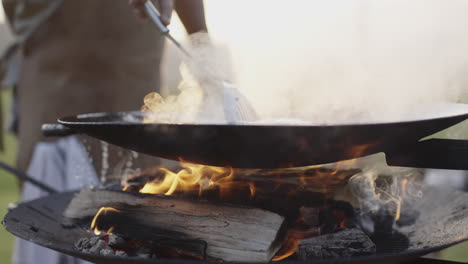 cooking outdoors on a campfire