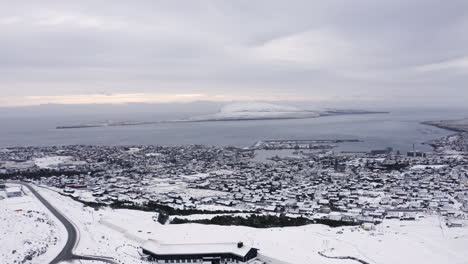 4k wide push in of tórshavn town covered in snow, faroe islands