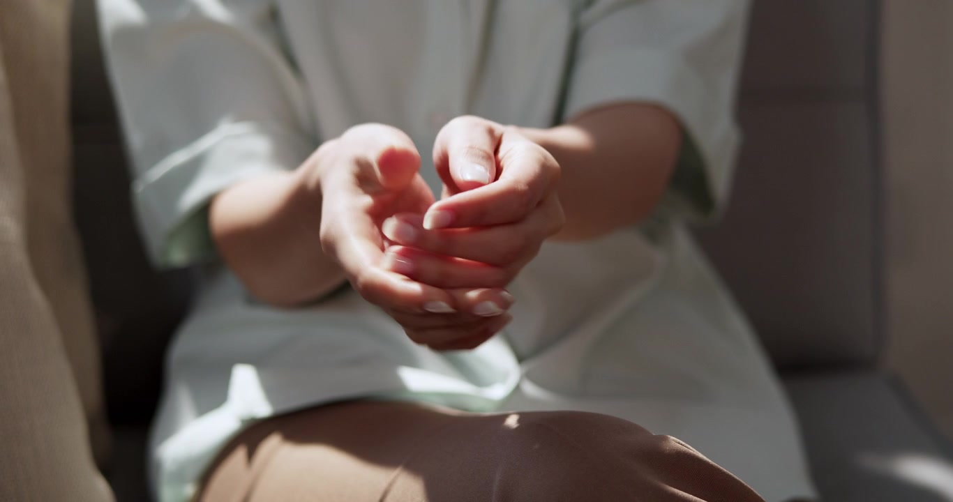 A serene moment showcasing hands practicing relaxation techniques to relieve stress and promote mindfulness.