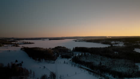 Nora,-Sweden,-right-pan-of-Norasjön,-frozen-lake,-winter-landscape