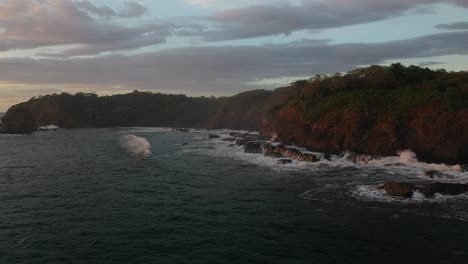 Epic-orbit-shot-of-rocks-and-coastline-in-amazing-location