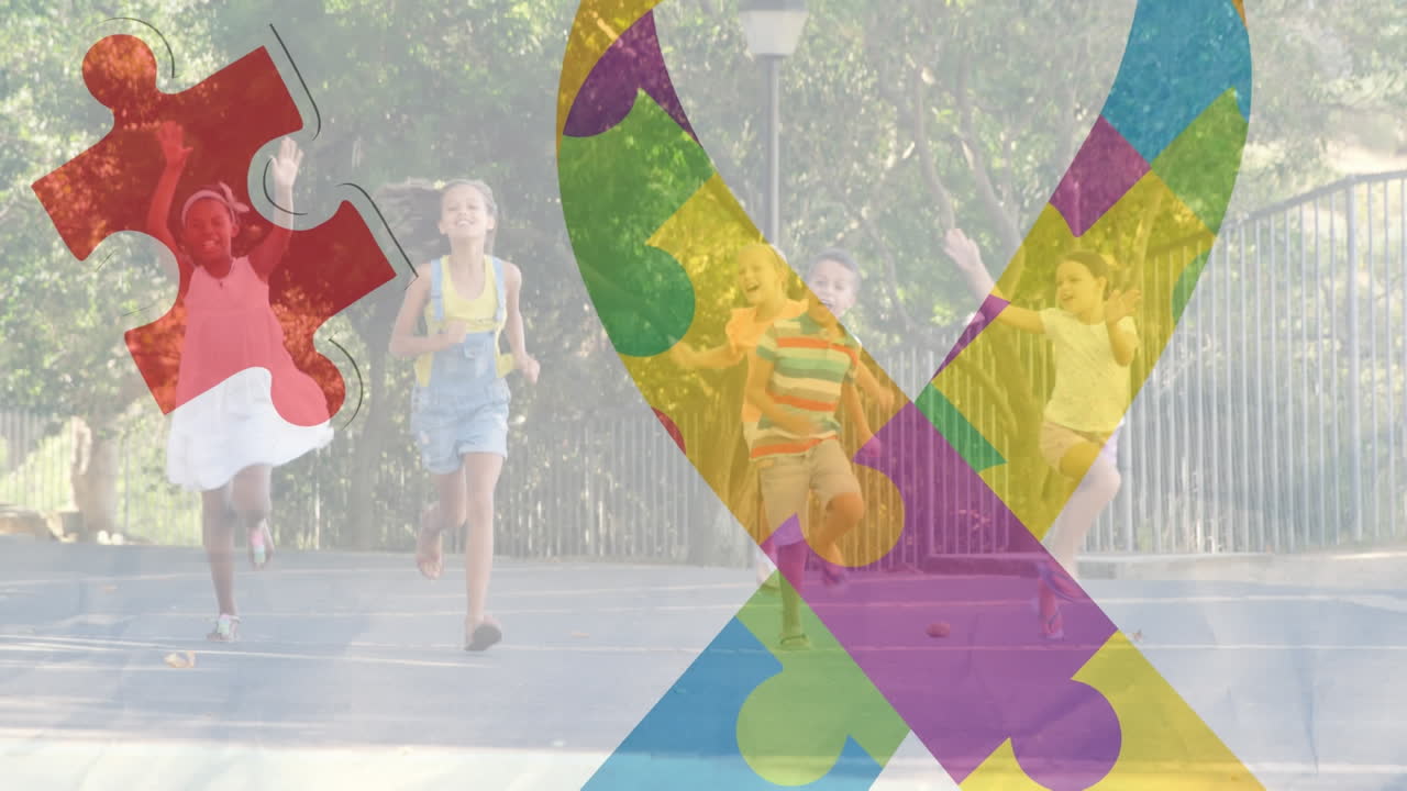 다채로운 퍼즐 조각의 애니메이션으로 학교 어린이들에게 자폐증 인식 리본을 만들고 있습니다.