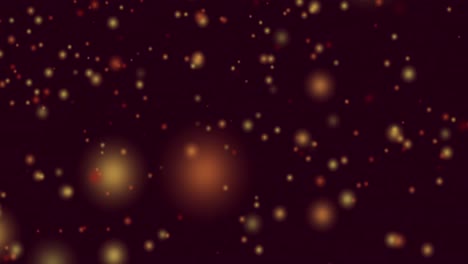 animación de manchas amarillas y rojas de luz volando en movimiento hipnótico sobre fondo negro