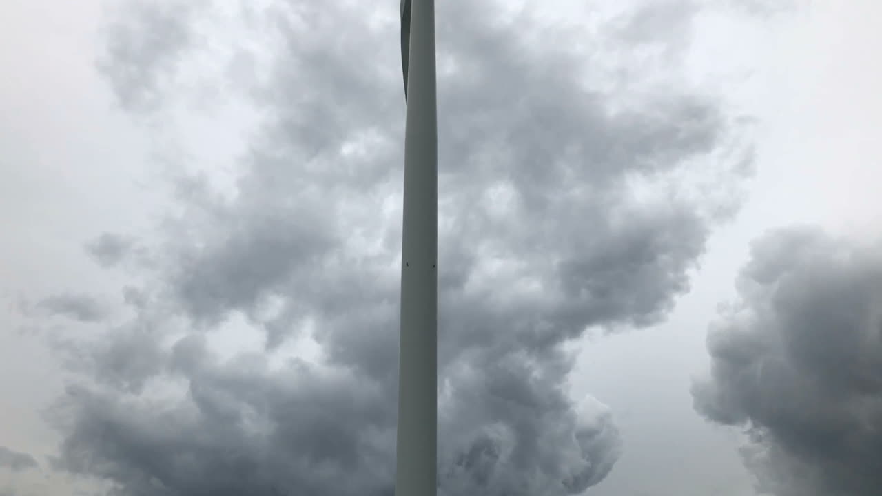 Windmill on a green field