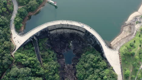 car moving on top of a water dam