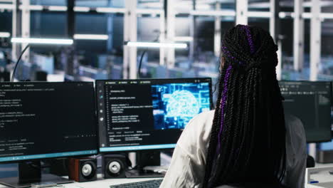 technicians in data center review ai diagnostics, analyzing neural networks