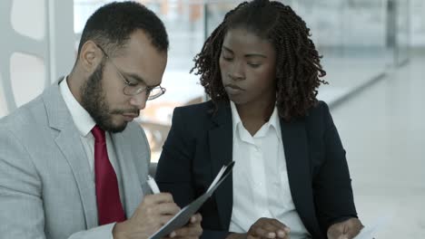 Young-business-people-working-with-papers