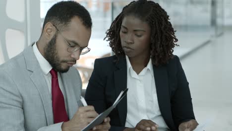 young business people working with papers