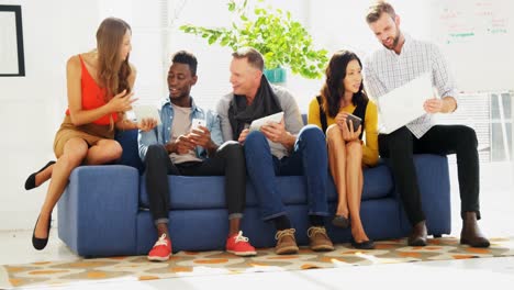 business colleagues sitting together on a couch