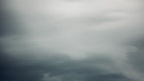 moody timelapse of dramatic clouds run fast