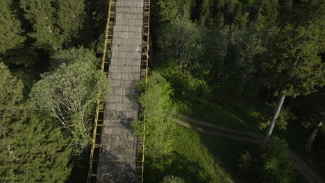 Old-Ski-Jumping-Facility-On-A-Mountain-Overlooking-Dense-Forest-In-Bakuriani,-Georgia