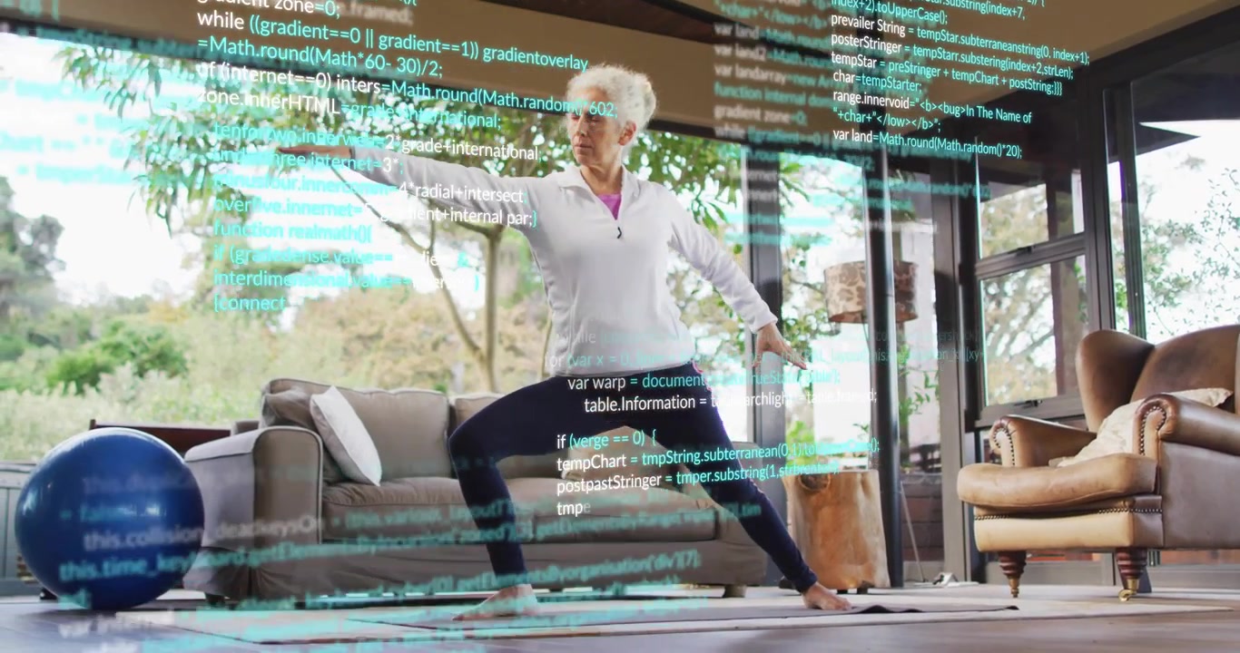 Senior woman shifting into warrior II on yoga mat in living room, code overlay tracking movements