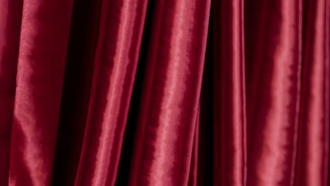 close-up view of red curtains