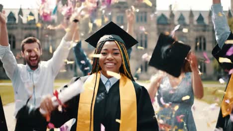 Celebrating Graduation Day: A Joyful Moment with Friends as They Toss Caps and Confetti, Signifying Accomplishments and New Beginnings