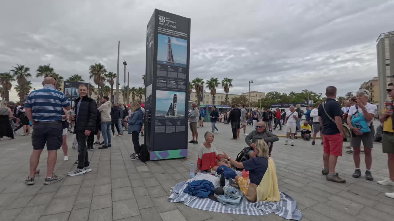 Crowds gather in Barceloneta, Barcelona for a sailing event