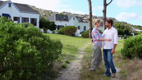 young couple walking hand in hand