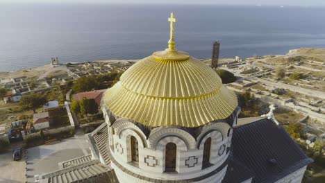 aerial view of a golden domed church