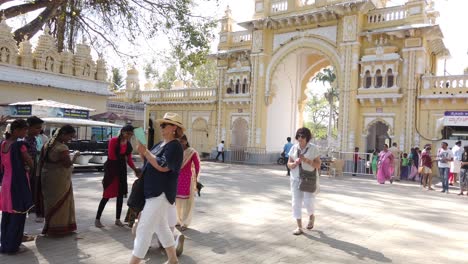 drift up from tourists to trees at trinesvaraswamy temple inside mysore palace on holy day on mysuru, karnataka, india.