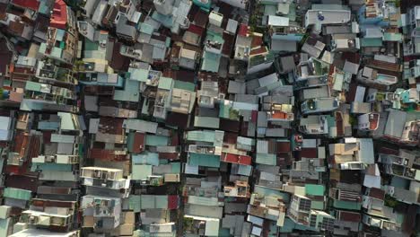 top down drone view over rooftops of an old and high density residential area of binh thanh district of saigon aka ho chi minh city, vietnam