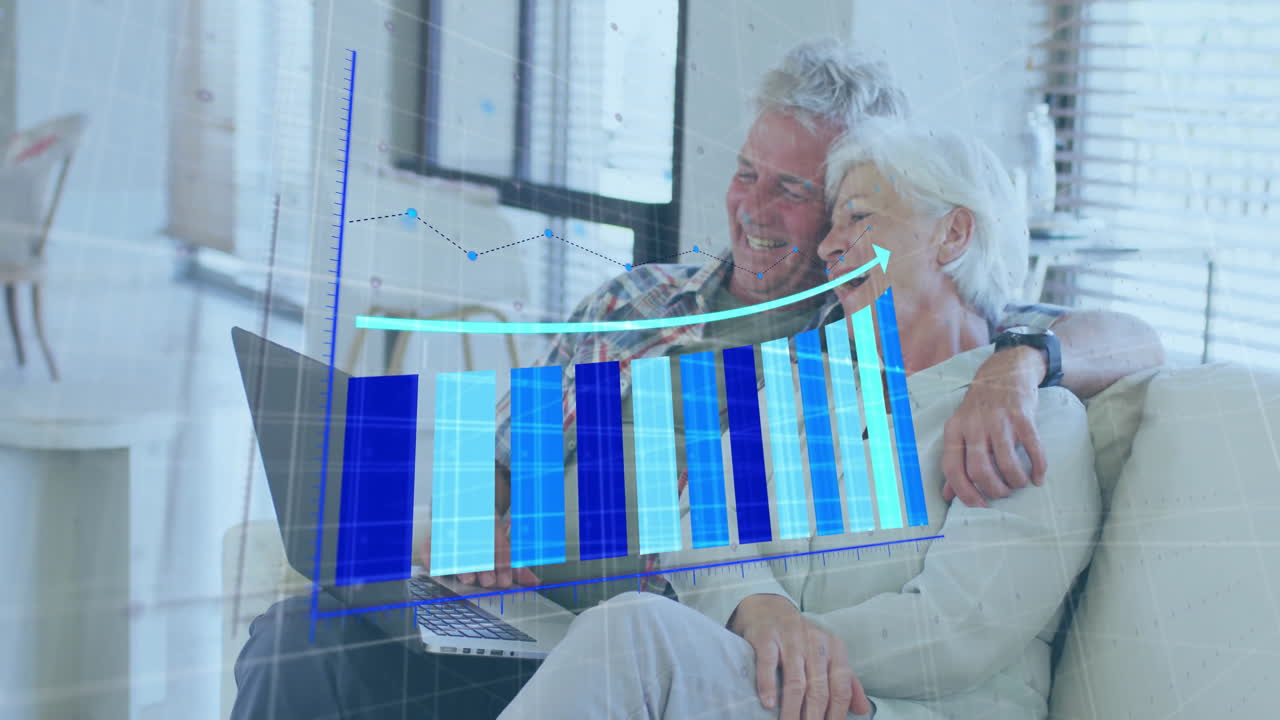 Bar chart and line graph animation over elderly couple using laptop on couch