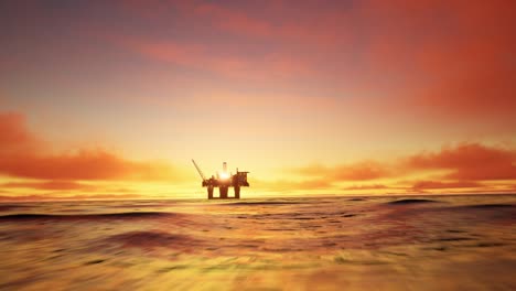 aerial view of offshore jack up drilling rig during sunset, oil and gas industry