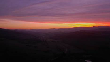 sunset over mountain valley