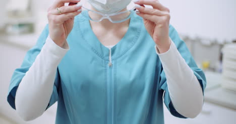 female doctor wearing protective mask on face and put glasses doctor at healtcare clinic 1