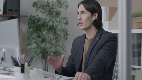 man in a business meeting via video conference