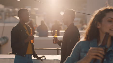 group-of-friends-hanging-out-together-enjoying-rooftop-party-at-sunset-taking-selfie-photos-using-smartphone-drinking-alcohol-having-fun-on-weekend-sharing-celebration