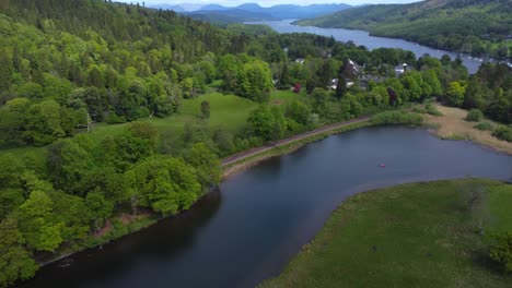 Cinematic-aerial-video-from-bottom-of-Lake-Windermere-at-Newby-Bridge,-looking-across-lake---Lake-District,-UK