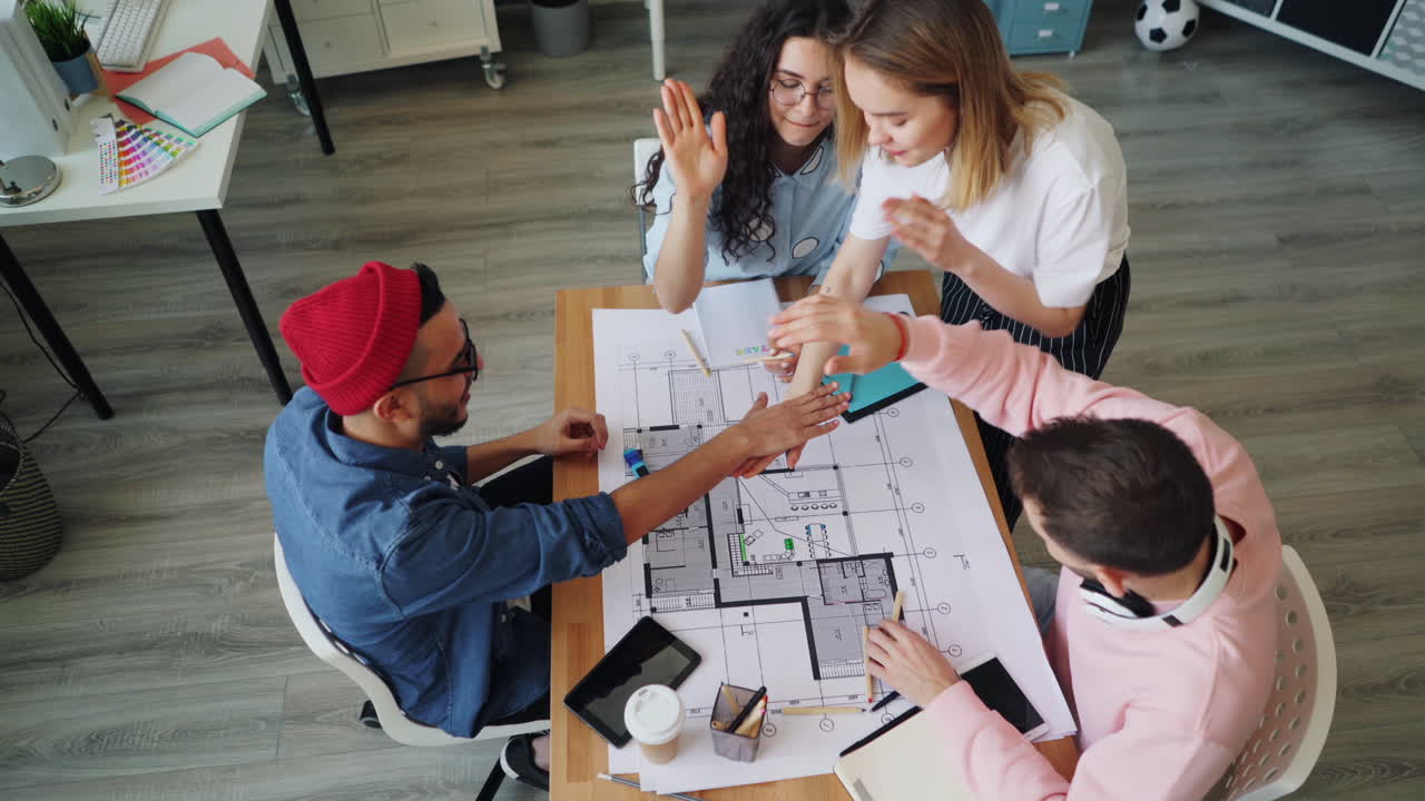 Team Celebrating a Successful Design Project