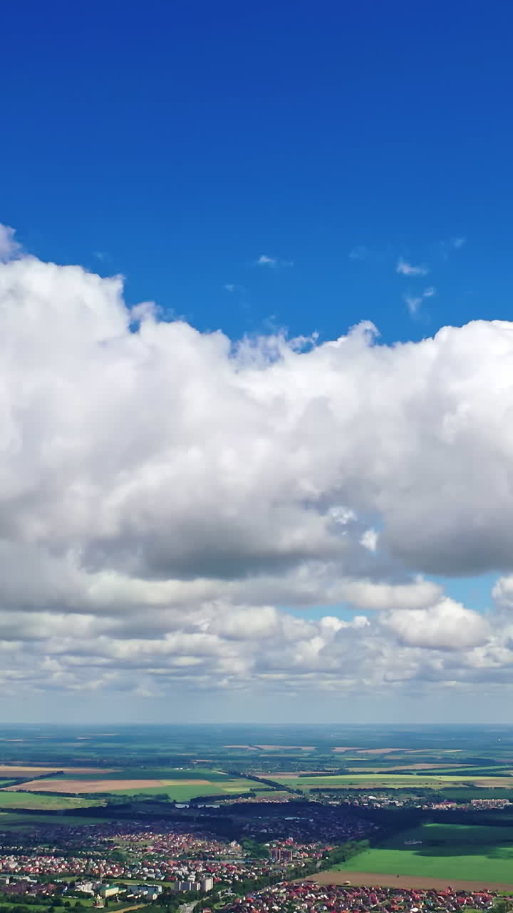 Clouds landscape over city. Part of city view above the clouds from drone