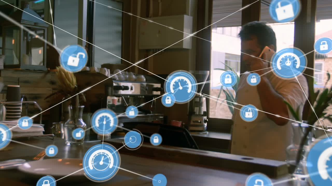 animación de una red de iconos digitales sobre un hombre caucásico hablando en un teléfono inteligente en un café.