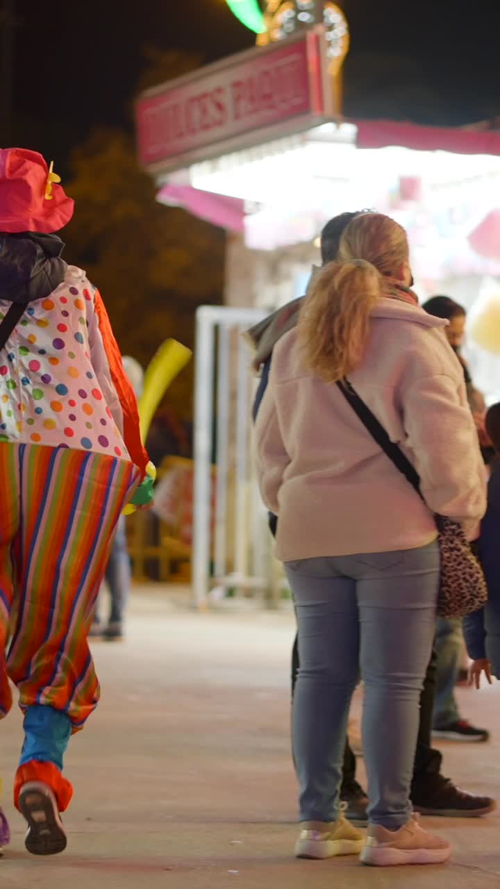 People Enjoying a Night Carnival Scene