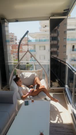 woman working from home on balcony