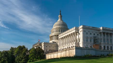 daytime time lapse of the north side of the us capitol building with clear blue skies