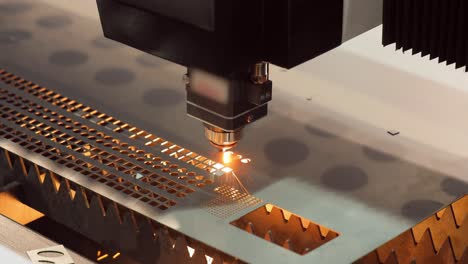 CNC-Laser-cutting-of-metal,-modern-industrial-technology.