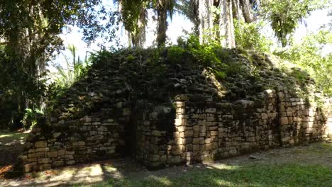 small building in between ball court and plaza merwin at kohunlich mayan site - quintana roo, mexico