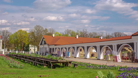 Pakruojis-manor-buildings-in-Lithuania,-time-lapse-on-sunny-and-cloudy-day