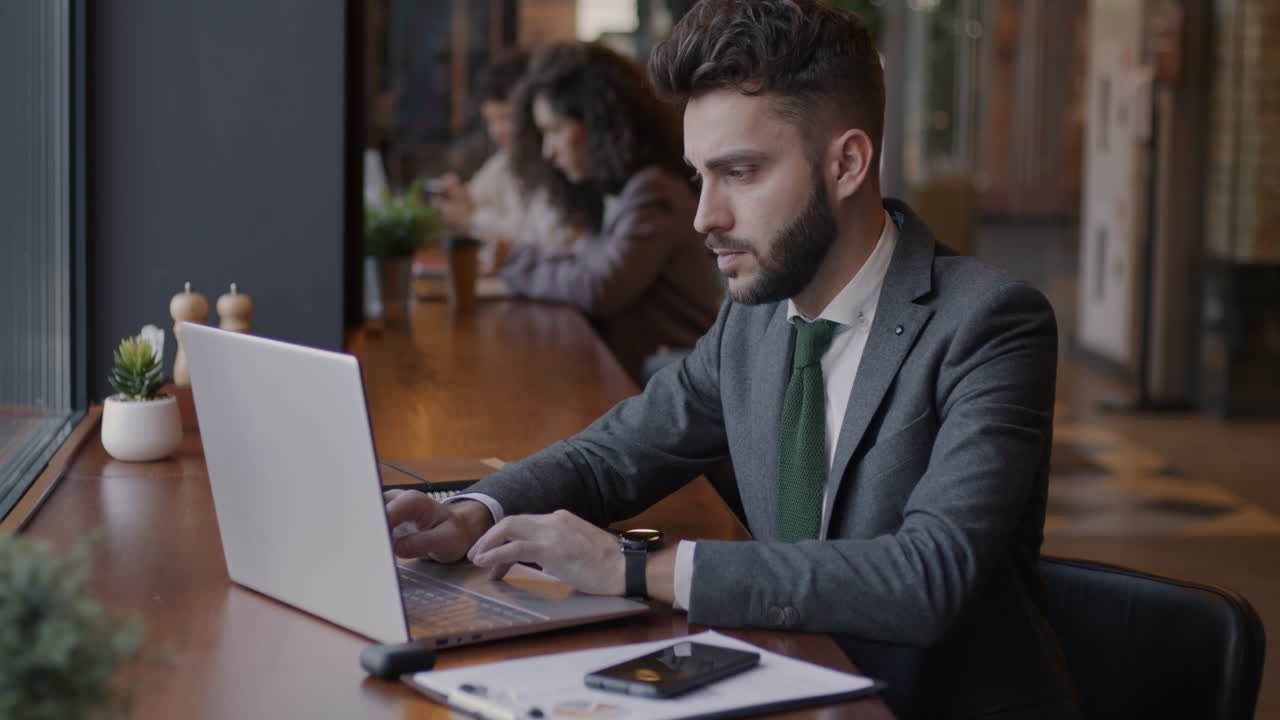 Business People Working in a Coffee Shop
