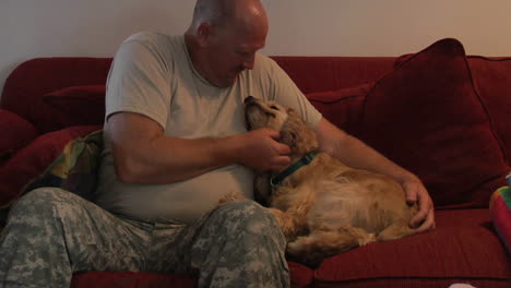 a soldier bonds with his dog