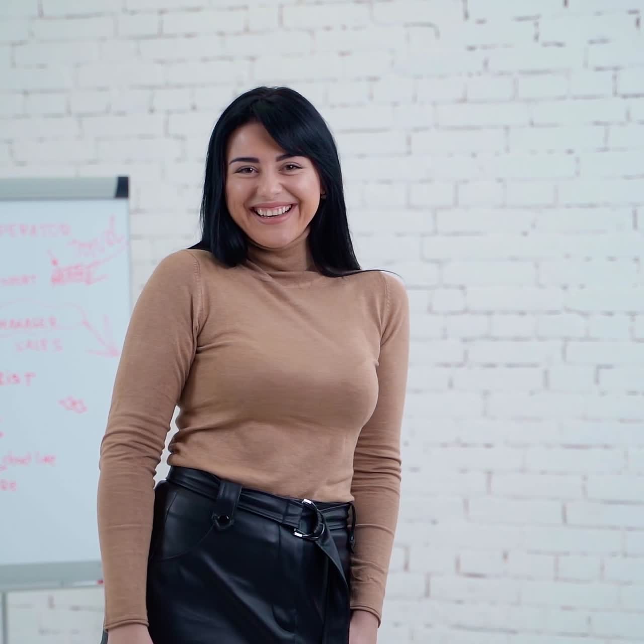 Happy business woman with dollar banknotes. Smiling young woman is throwing money in the studying room. Successful girl scattering money.