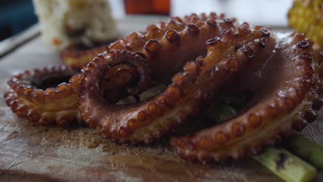 Delicious-grilled-whole-fresh-octopus-in-Mazatlan,-Sinaloa-Mexico-served-with-vegetables