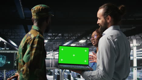 military command center engineering team using chroma key notebook