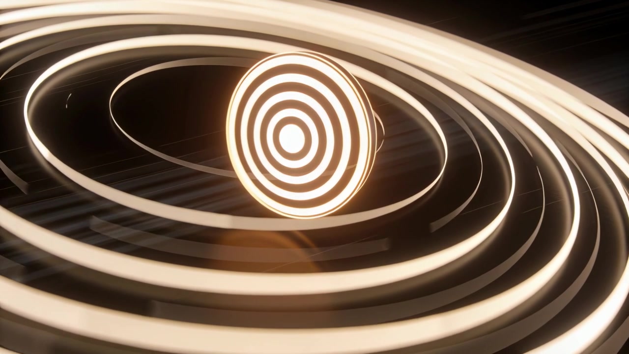 Rotating glowing concentric rings shifting on power-up in dark studio, producing disc reflections