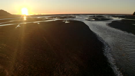 low slider shot over icelandic braided rivers