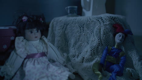 vintage dolls and puppet in low light