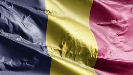bandera textil de chad ondeando en el bucle del viento. bandera chadic balanceándose en la brisa. tejido textil de tela. fondo de relleno completo. bucle de 10 segundos.
