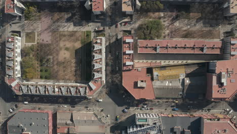 Blocks-of-apartment-buildings-in-residential-urban-borough.-Top-down-shot-of-housing-estate.-Barcelona,-Spain