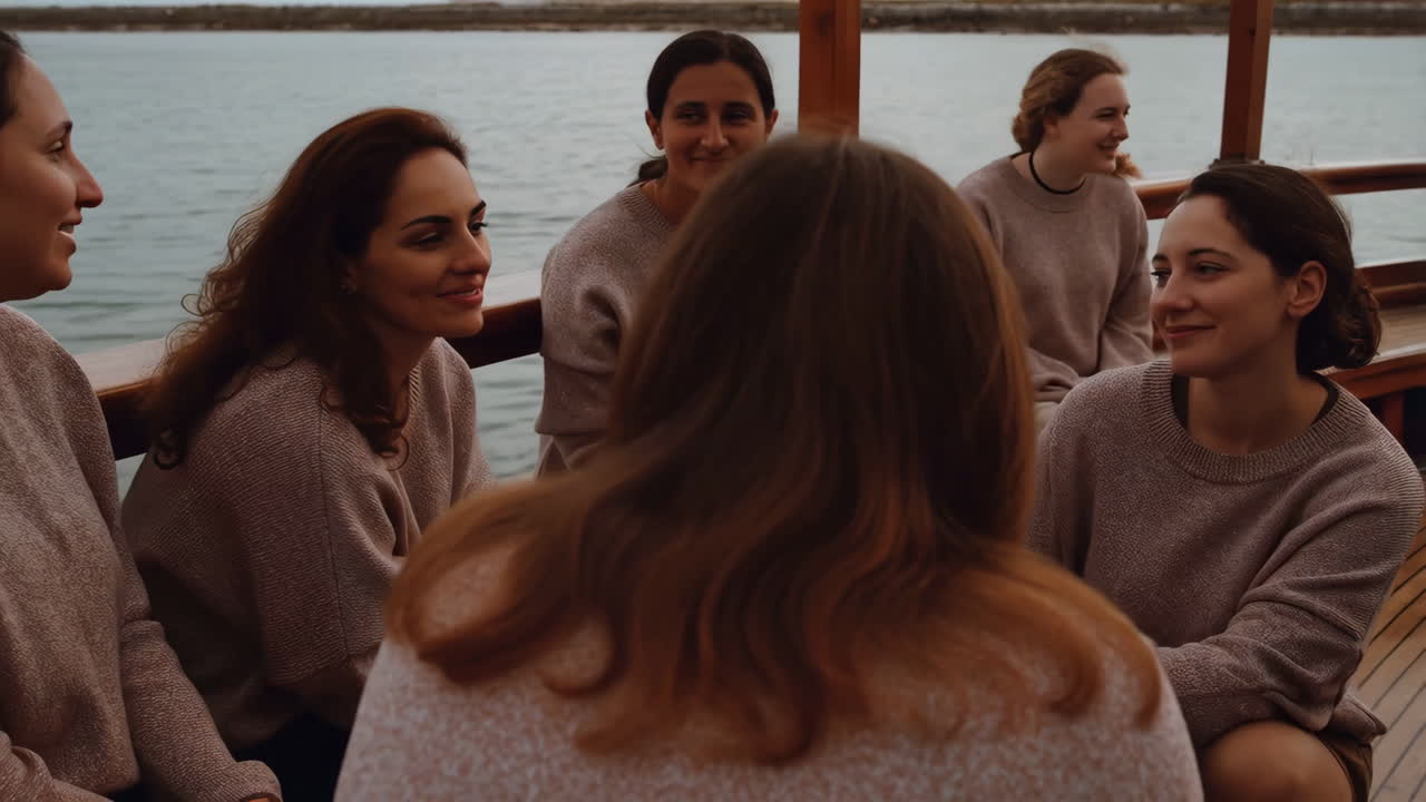 Group of women conversing on a boat